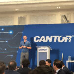 Tether's Paolo Aldoino is cheered at Cantor Conference for the stablecoin publisher saying "we've gone through hell"